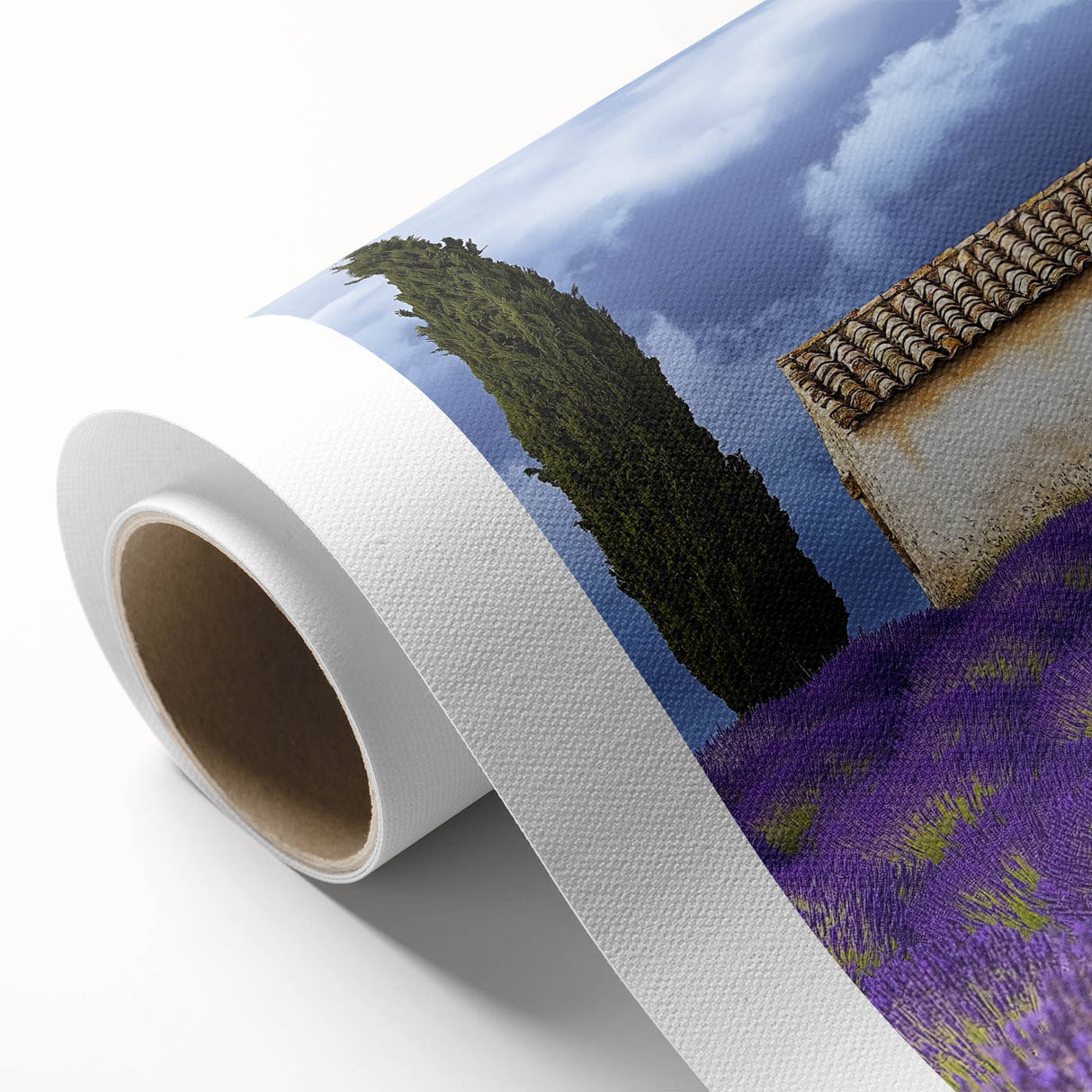 Vibrant rolled canvas depicting a serene landscape with lush green fields and a bright blue sky, packaged securely in a protective cardboard tube for easy transport.