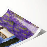 Vibrant rolled print showcasing a serene landscape with lush green fields and a clear blue sky, ideal for home or office decor, packaged securely in a tube.
