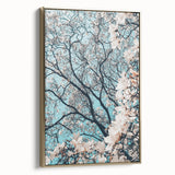 Framed canvas featuring a vintage-style landscape painting with spring theme, subdued gold and green tones.