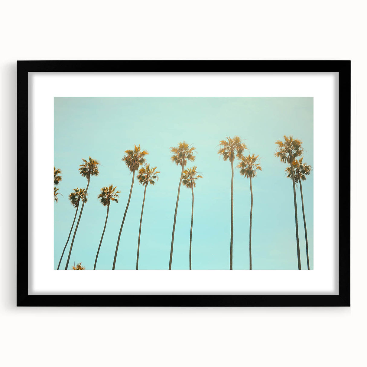 Abstract art print featuring vibrant, textured swirls of blue, pink, and yellow on a large canvas.