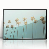 Large abstract wall art featuring mid-century modernist shapes in vibrant orange and blue tones on a framed acrylic print.