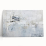 Abstract strokes wall art on stretched canvas, featuring vibrant colors and dynamic shapes, leaning against a neutral wall for an artistic display.