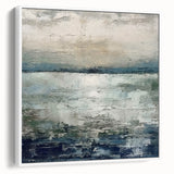 Framed canvas art displaying abstract strokes in soothing white and gray tones. The artwork features a modern design that enhances contemporary home decor.