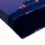 Close-up of a stretched canvas artwork showcasing a vibrant landscape with a majestic castle, rich colors, and intricate details, perfect for home decor.