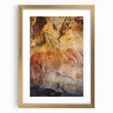 Framed landscape artwork showcasing a vibrant cave scene, featuring a gold mat and intricate detailing, ideal for home decor or art collectors.