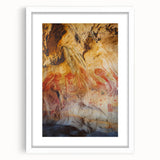 Framed landscape artwork depicting a serene cave scene with white matting, perfect for home decor, showcasing natural hues and tranquil ambiance. Ideal for art enthusiasts.