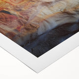 Rolled canvas artwork showcasing a stunning landscape with caves, featuring rich earthy tones and intricate details, perfect for enhancing home decor.