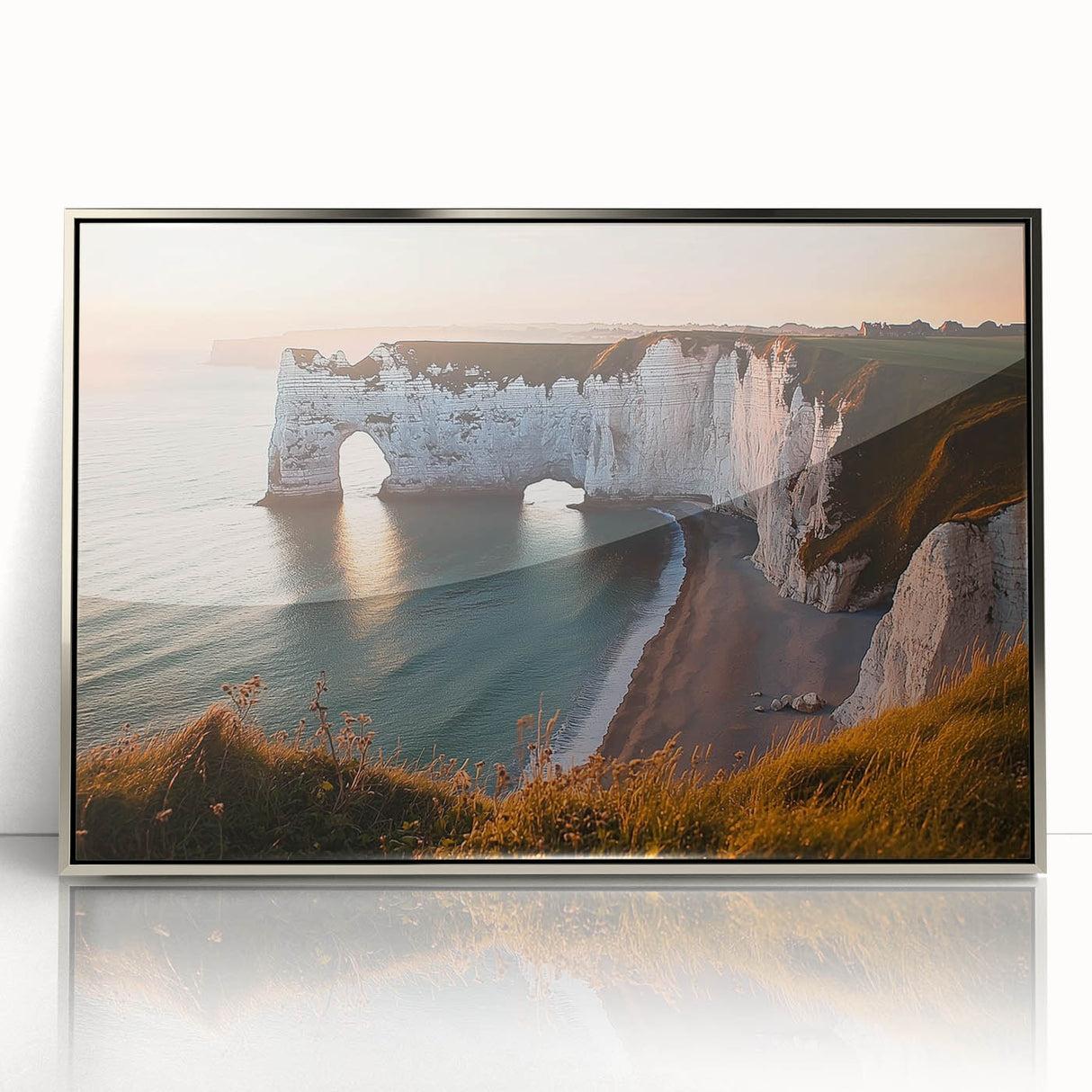 Framed acrylic landscape artwork showcasing dramatic cliffs and serene skies, highlighted in silver frame for a modern touch, perfect for home decor.