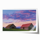 Landscape barn print showcasing a serene rural scene with vibrant colors, rolled up for shipping in a protective cardboard tube, ideal for home decor.