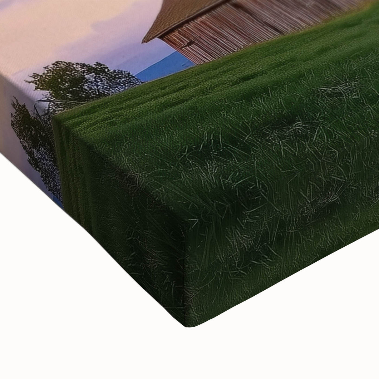 Close-up of a stretched canvas featuring a vibrant landscape barn design, showcasing rich colors and intricate details, ideal for rustic home decor.
