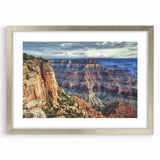 Framed landscape artwork showcasing majestic canyons in a silver mat, perfect for enhancing home decor with natural beauty and elegance. Ideal for art enthusiasts.