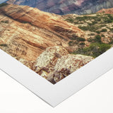 Vibrant rolled canvas artwork depicting a stunning canyon landscape, showcasing rich earth tones and intricate textures, perfect for home decor or nature lovers.