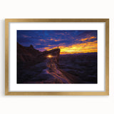 Desert landscape artwork framed in an elegant gold mat, showcasing vibrant hues of orange and yellow, perfect for enhancing modern home decor.