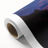 Desert landscape rolled canvas showcasing vibrant hues of orange and yellow, capturing a serene sunset over sand dunes, ideal for home decor and artistic display.