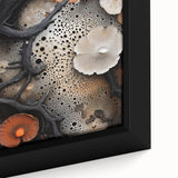 Close-up of textured black wall art with colorful abstract elements on framed canvas, suitable for living room decor.