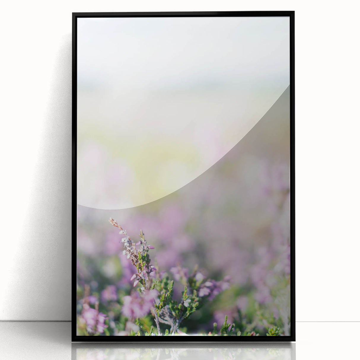 Large abstract wall art featuring swirling patterns in muted earth tones, framed in black acrylic.