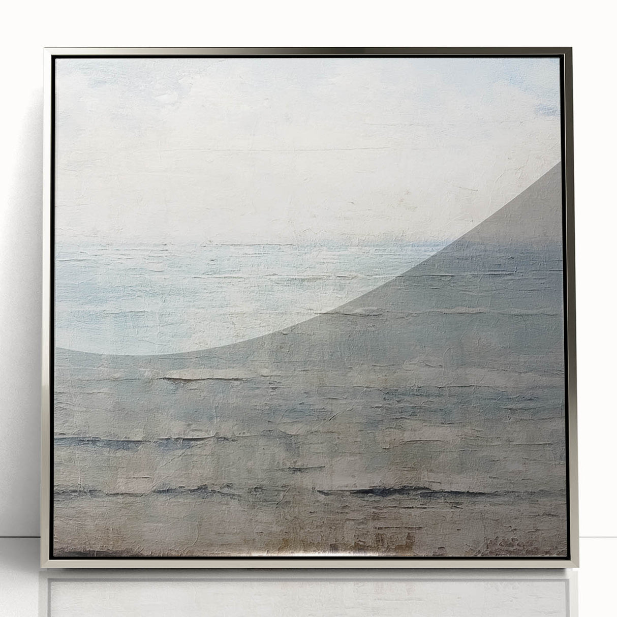 Framed wall art featuring abstract strokes in silver and gray tones, showcasing a modern design that enhances contemporary interiors with elegance.