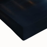 Close-up view of a stretched canvas artwork depicting a serene landscape with a majestic castle, showcasing vibrant colors and intricate details, perfect for home decor.