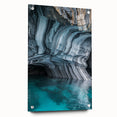 Acrylic glass artwork showcasing a vibrant landscape with caves, viewed from the side and accented with decorative pins, perfect for modern home decor.