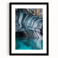 Framed landscape artwork showcasing a cave scene with a black mat, perfect for home decor, emphasizing natural beauty and artistic design.