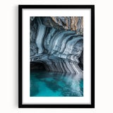 Framed landscape artwork showcasing a cave scene with a black mat, perfect for home decor, emphasizing natural beauty and artistic design.