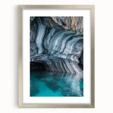 Framed landscape artwork featuring a cave scene with a silver mat, ideal for home decor, showcasing intricate details and natural colors, enhancing interior aesthetics.
