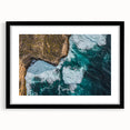 Black-framed landscape art print displaying dramatic cliffs with vibrant colors and intricate details, perfect for enhancing home decor and adding depth to any room.