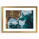 Gold-framed landscape artwork showcasing dramatic cliffs against a vibrant sky, designed with a mat for added elegance, perfect for enhancing any interior decor.