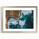 Framed landscape art print showcasing dramatic cliffs under a vibrant sky, elegantly matted in silver, perfect for enhancing modern home decor.