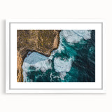 Framed landscape artwork showcasing dramatic cliffs, featuring a white mat and sleek frame, perfect for enhancing modern home decor with nature-inspired aesthetics.