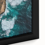 Framed canvas artwork showcasing a vibrant landscape with dramatic cliffs, rich colors, and intricate details, perfect for enhancing home decor and interior aesthetics.