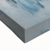 Close-up of an abstract geometric stretched canvas art piece, showcasing vibrant colors and intricate patterns, ideal for modern home decor. The design emphasizes sharp angles and dynamic shapes, creating a visually striking focal point for any room.