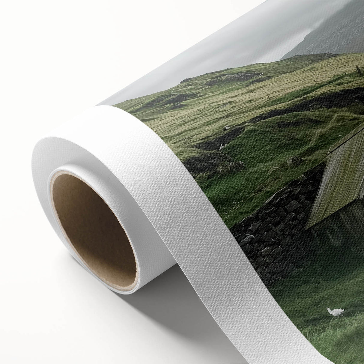 Landscape barn scene printed on rolled canvas, showcasing vibrant colors and detailed textures, housed in a protective cardboard tube for safe shipping.