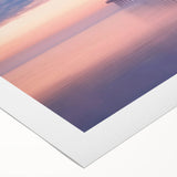 Rolled canvas art showcasing a vibrant landscape bridge design, featuring rich colors and intricate details, securely packaged in a protective cardboard tube for safe shipping.