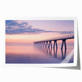 Rolled print showcasing a stunning landscape bridge design, featuring vibrant colors and intricate details, packaged securely in a durable cardboard tube for safe delivery.