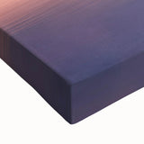 Close-up of a stretched canvas artwork depicting a serene landscape bridge, showcasing vibrant colors and intricate details, perfect for home decor enhancement.