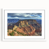 Landscape art print featuring canyons in warm earthy tones, framed with a sleek white mat, showcasing a modern aesthetic ideal for home decor.