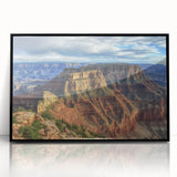 Framed acrylic artwork showcasing a stunning landscape of canyons in rich earth tones, highlighting natural textures and depth, perfect for modern home decor.