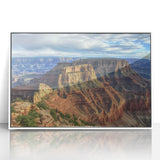 Framed acrylic landscape artwork showcasing vibrant canyon colors and intricate details, set in a sleek white frame, perfect for modern home decor.