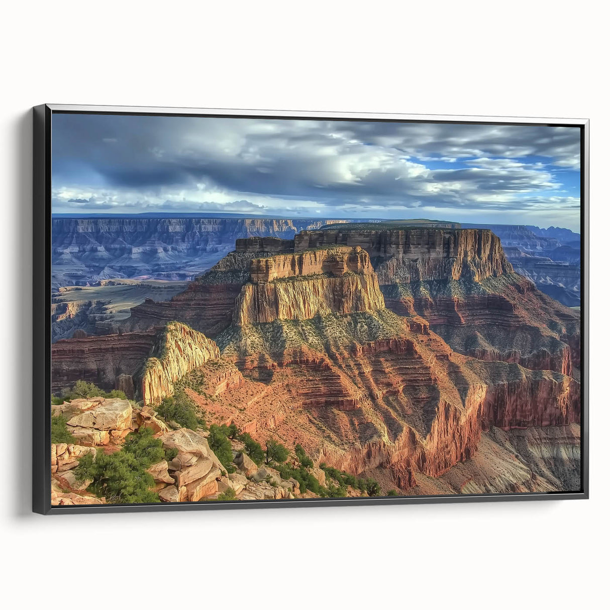 Framed canvas artwork depicting a scenic landscape of canyons, showcasing rich earth tones and dramatic rock formations, ideal for enhancing home decor and aesthetic appeal.