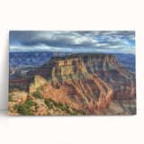 Stretched canvas artwork depicting a vibrant landscape of picturesque canyons, showcasing rich earth tones and dramatic rock formations, perfect for home decor.