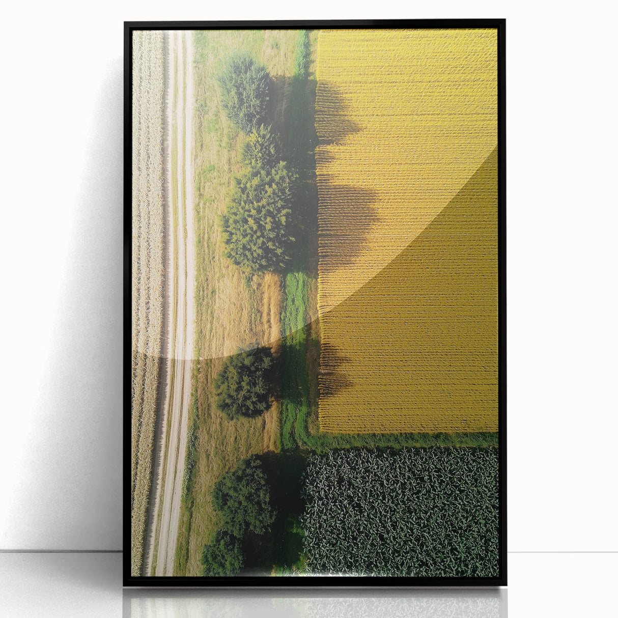 Framed acrylic landscape artwork showcasing serene countryside scenery with vibrant colors and a sleek black frame, ideal for home decor.