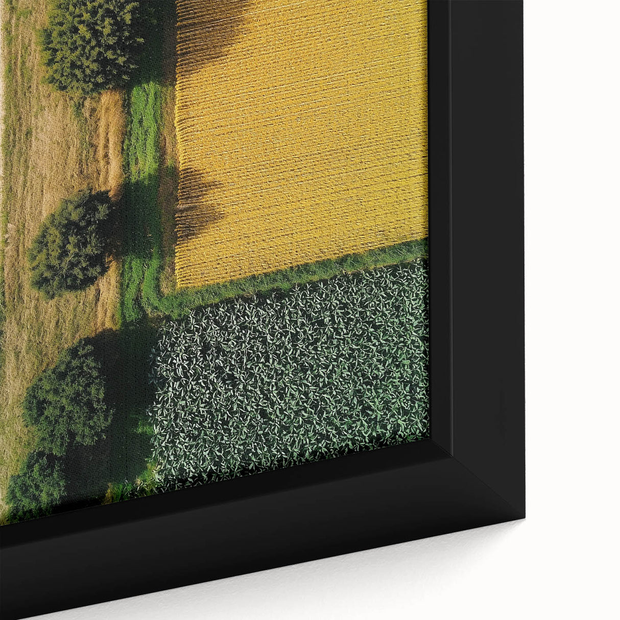 Framed canvas artwork showcasing a vibrant countryside landscape, with rolling hills and a serene sky, ideal for enhancing home decor and bringing nature indoors.