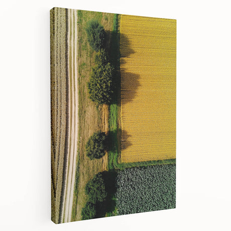 Stretched canvas artwork depicting a serene countryside landscape with rolling hills, vibrant greenery, and a clear blue sky, ideal for home decor.