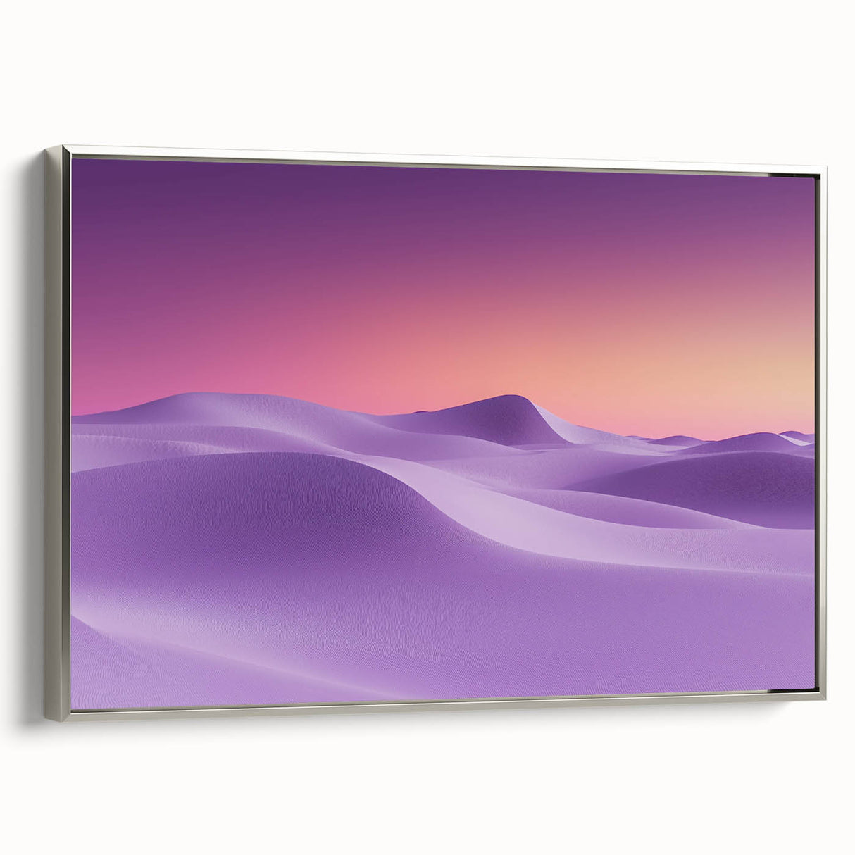Framed canvas artwork showcasing a stunning desert landscape with vibrant hues of orange and gold, accented by a sleek silver frame, perfect for home decor.
