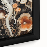Close-up of textured black wall art featuring colorful abstract elements on a framed canvas, ideal for living room decor.