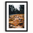 Extra large abstract art print with textured, colorful art depicting fall, framed in black, ideal for living room decor.