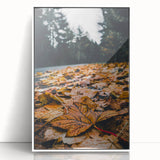 Art deco poster featuring autumn leaves in red and orange hues on a white acrylic framed canvas.