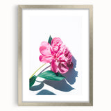 Textured art print featuring abstract swirls in vibrant spring hues on a silver-framed canvas, ideal for bedroom decor.