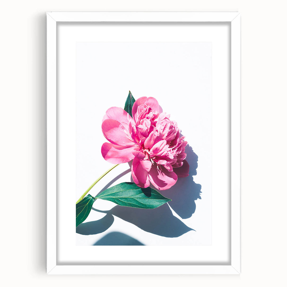 Abstract art print featuring swirling spring hues on a white framed canvas, suitable for bedroom or dining room decor.
